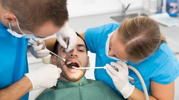 Painless surgical tooth extraction